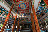 Vientiane, Laos - Pha That Luang, among the Other structures on the ground there is an open sala decorated with brightly colored paintings.  